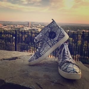Christian Louboutin size ten splatter sneakers